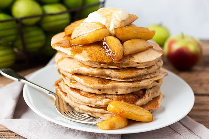 Apple Pie Pancakes - A spiced apple pancake recipe, topped with syrup poached apples and a spoonfuls of creamy, thick crème fraiche.  This is one glorious breakfast!