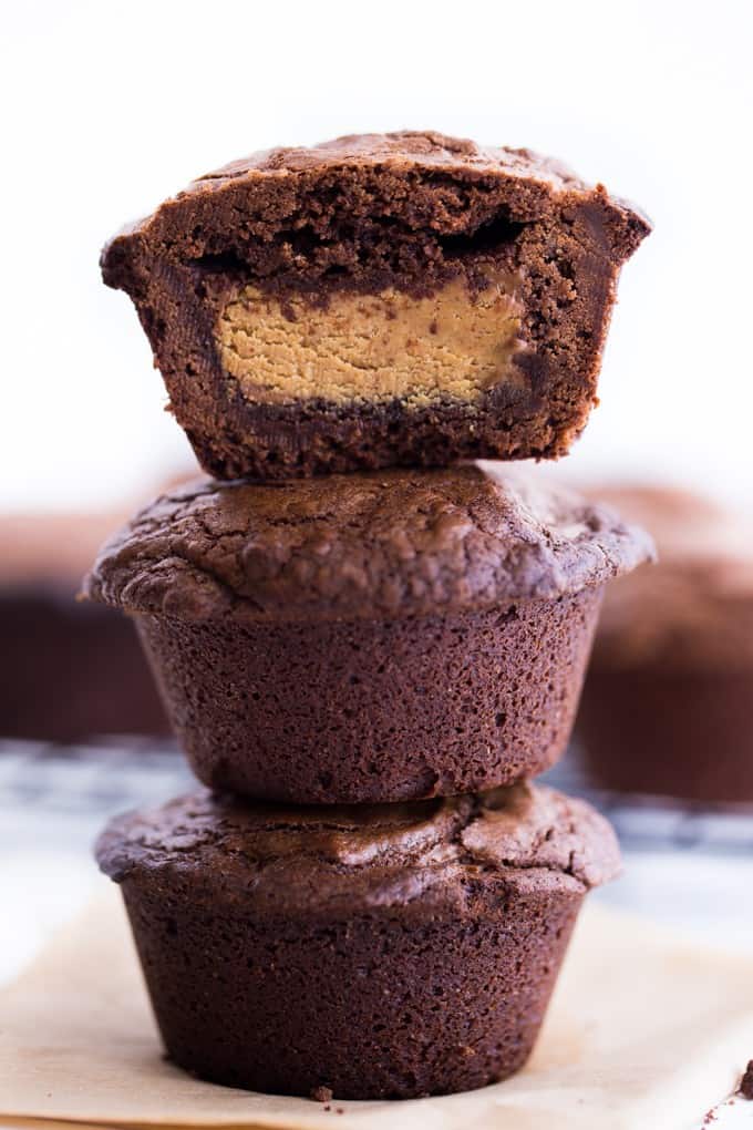 Reese's Stuffed Brownies - Giant Reese's Peanut Butter Cups are stuffed inside a rich chocolate brownie. Each bite is pure chocolate heaven! 