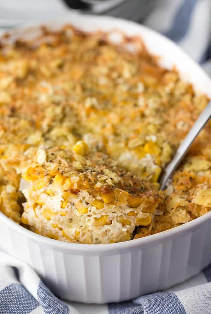 Cheesy Corn Casserole - A comforting casserole dish loaded with sweet corn, cheese and a crunchy soda cracker topping. 