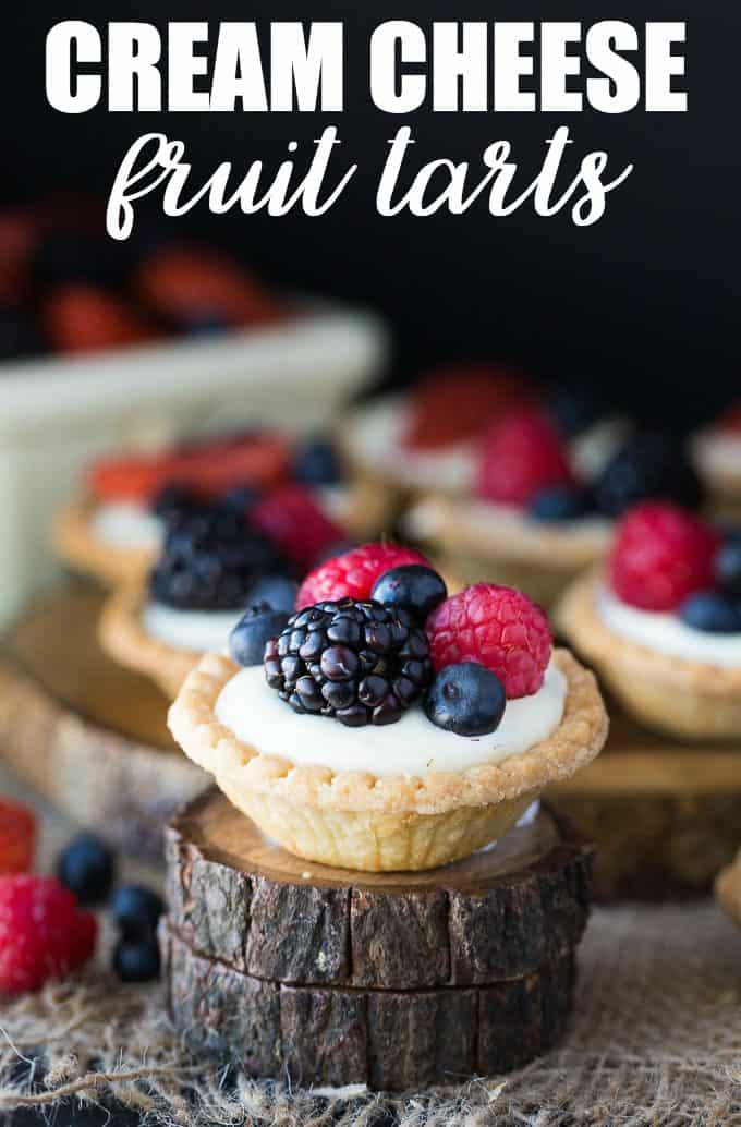 Cream Cheese Fruit Tarts - A sweet and vibrant way to dress up your party's dessert table! These decadent treats won't last long.