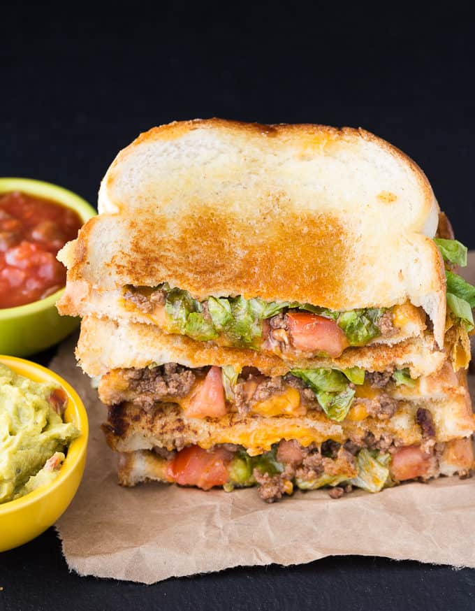Taco Grilled Cheese Sandwich - Celebrate National Grilled Cheese Day by taking two recipe favourites and combining them into one mouthwatering sandwich! So easy. So good.