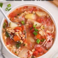 manhattan clam chowder bowl with a spoon.