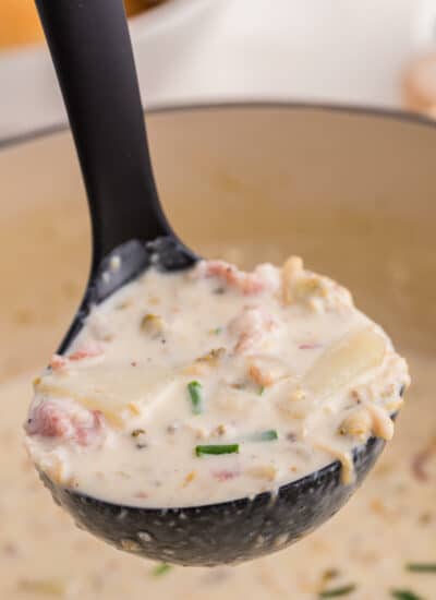 A ladle of new england clam chowder.