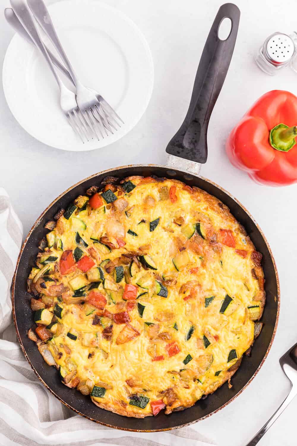 Caramelized Onion, Red Pepper & Zucchini Frittata - Loaded with red pepper and zucchini, this veggie-packed dish is healthy and filling - and low carb too!