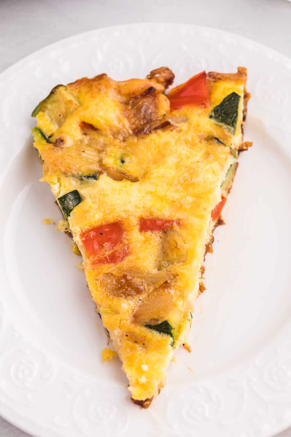 Caramelized Onion, Red Pepper & Zucchini Frittata - Loaded with red pepper and zucchini, this veggie-packed dish is healthy and filling - and low carb too!