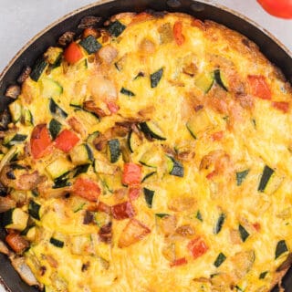 Caramelized Onion, Red Pepper & Zucchini Frittata - Loaded with red pepper and zucchini, this veggie-packed dish is healthy and filling - and low carb too!