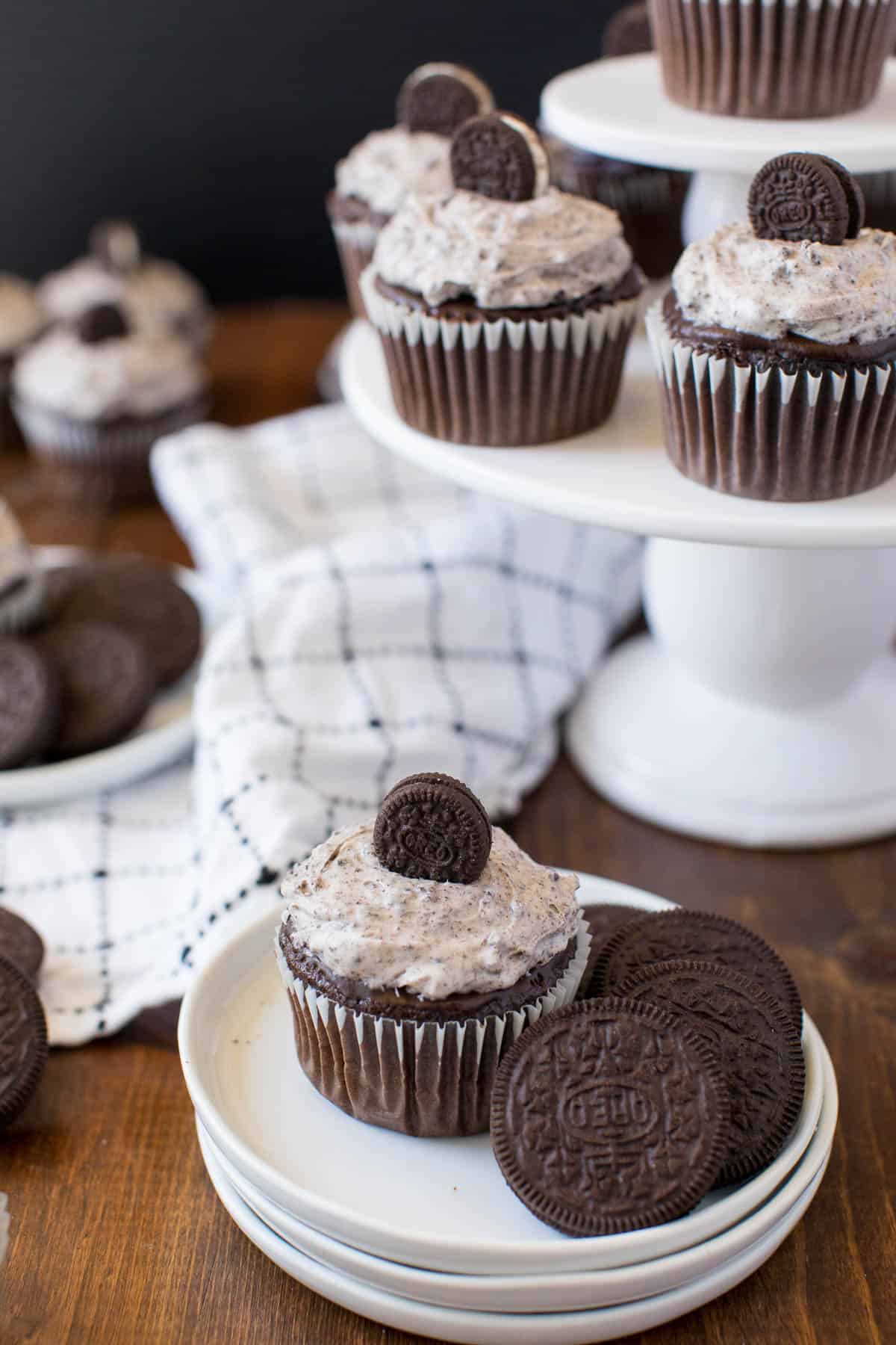 Oreo Cupcakes - Chocolate Cupcakes topped with a rich chocolate ganache and cream cheese & Oreo frosting.