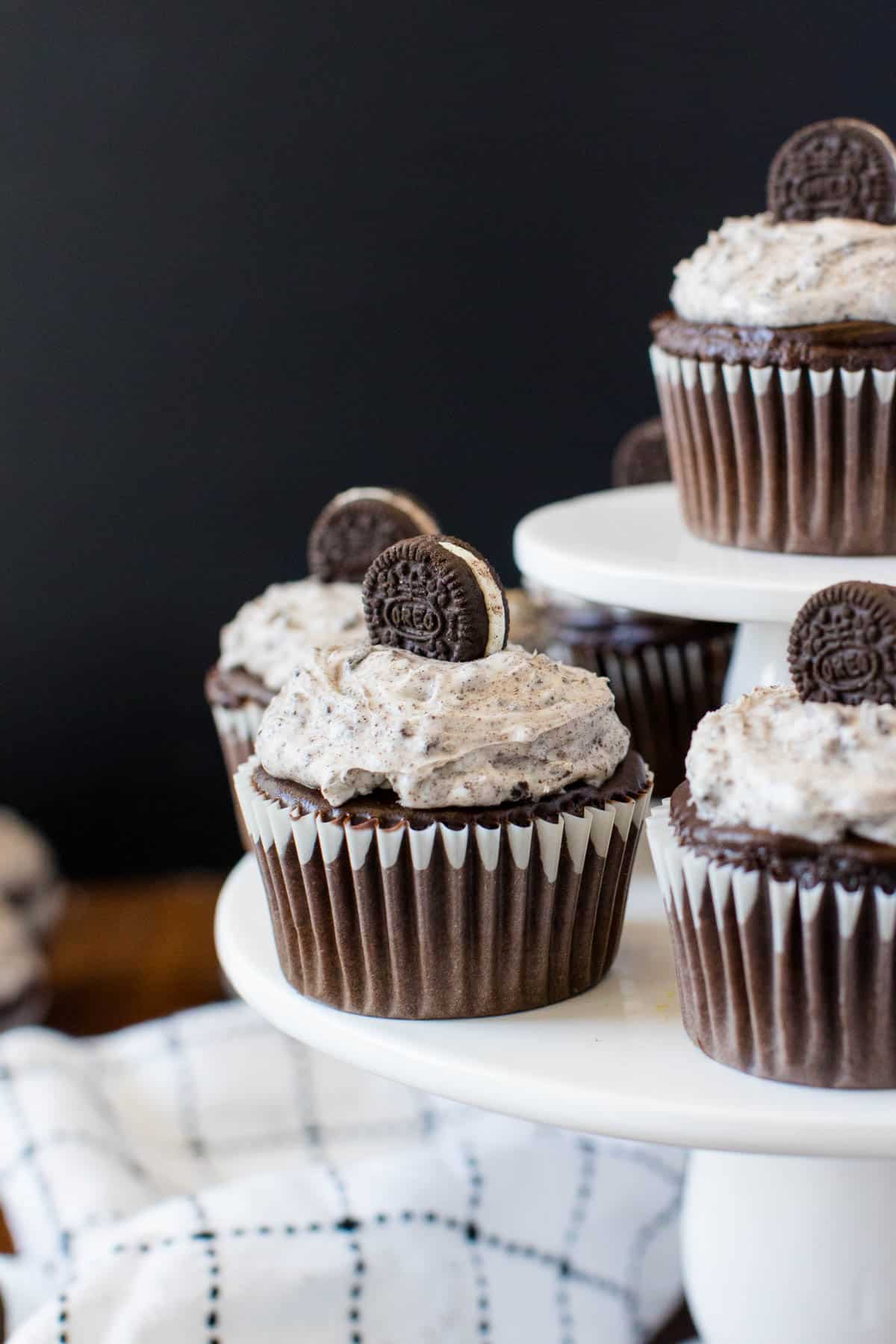 Oreo Cupcakes - Chocolate Cupcakes topped with a rich chocolate ganache and cream cheese & Oreo frosting.