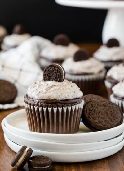 Oreo Cupcakes - Chocolate Cupcakes topped with a rich chocolate ganache and cream cheese & Oreo frosting.
