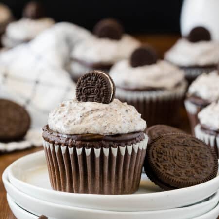 Oreo Cupcakes - Chocolate Cupcakes topped with a rich chocolate ganache and cream cheese & Oreo frosting.