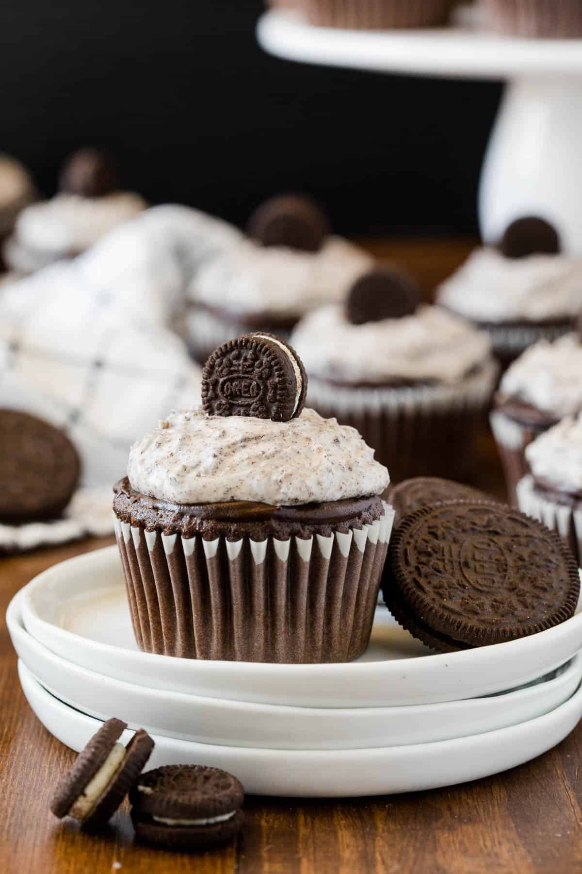 Oreo Cupcakes - Chocolate Cupcakes topped with a rich chocolate ganache and cream cheese & Oreo frosting.
