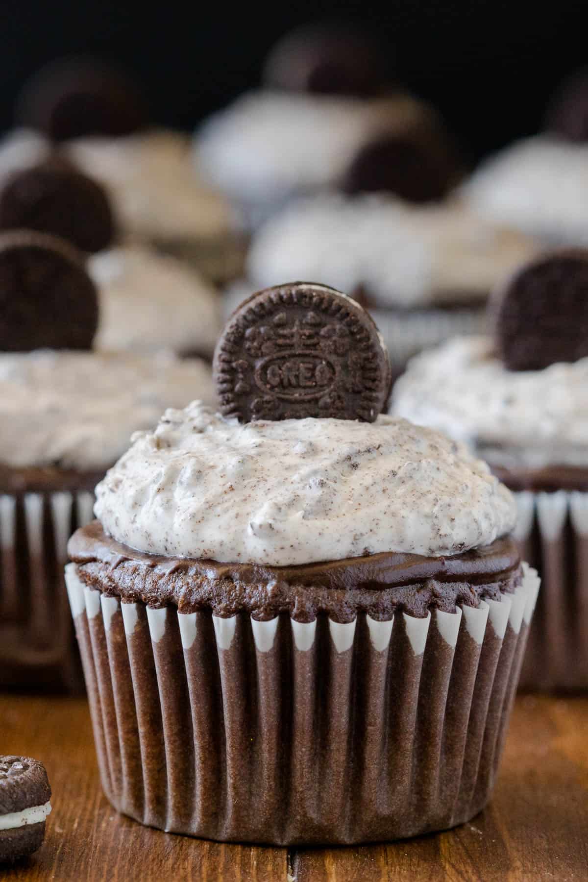 Oreo Cupcakes - Chocolate Cupcakes topped with a rich chocolate ganache and cream cheese & Oreo frosting.