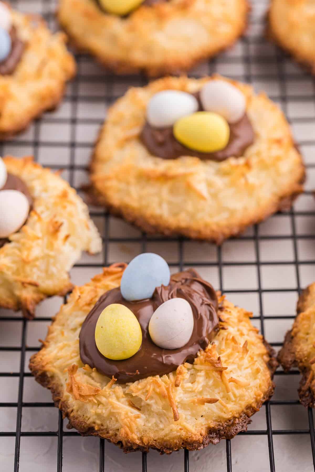 Coconut Macaroon Nutella Cookie Nests on a cooling rack.