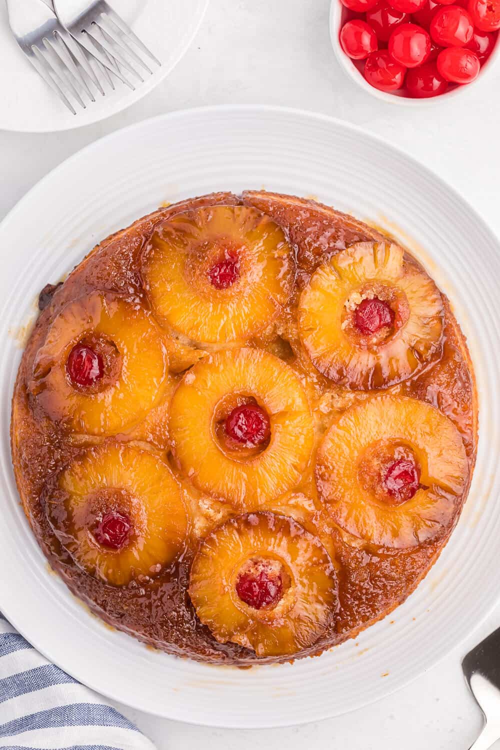 Pineapple upside down cake on a white plate