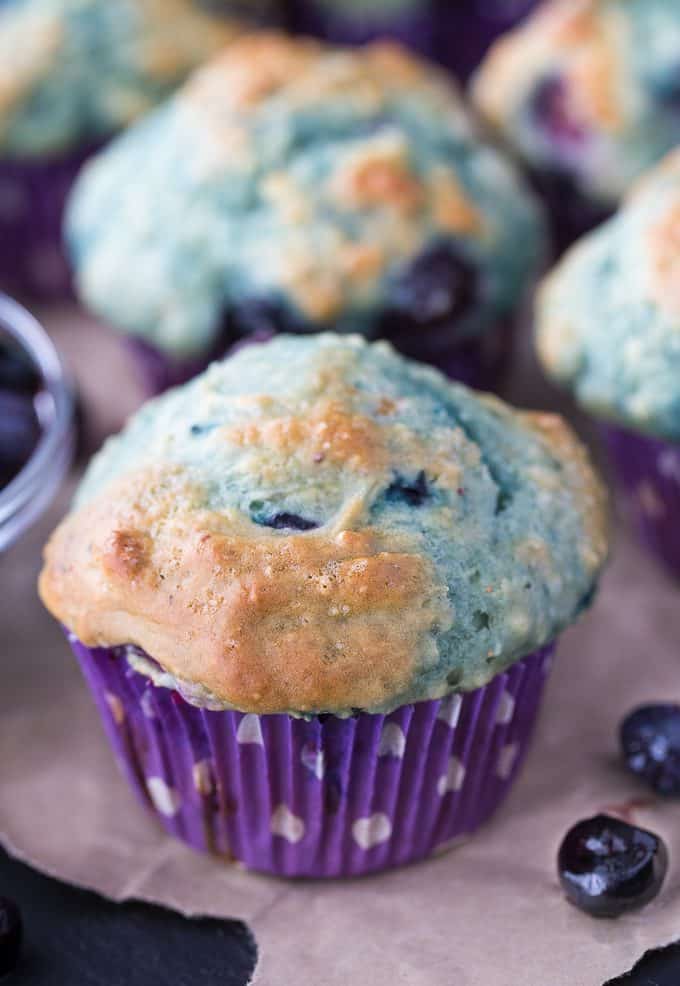 Blueberry Yogurt Muffins - These blueberry packed muffins are a perfect make-ahead for snacks and breakfast on-the-go. Using Greek yogurt in the recipe helps amp up the protein!