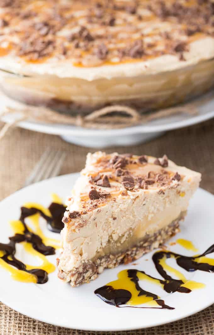 Frozen Peanut Butter Pie - Multiple layers of YUM including a pretzel crust, chocolate layer, caramel layer followed by peanut butter ice cream.