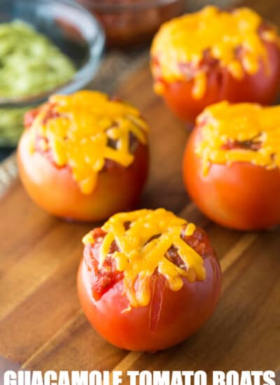 Guacamole Tomato Boats - Stuffed tomatoes with a Mexican flair! Serve them at a party or for a healthy snack.