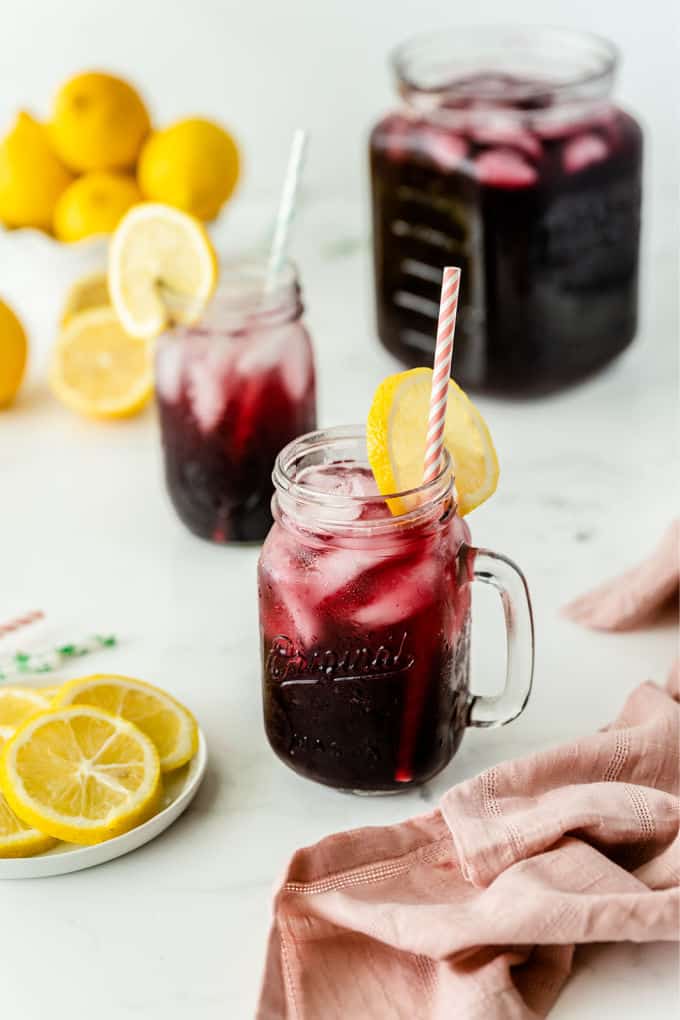 Sparkling Grape Lemonade - With bubbly lemon lime soda, frozen grape punch and lemonade, this drink is so easy to make when entertaining, or when you want to treat the kids to a special summery drink.