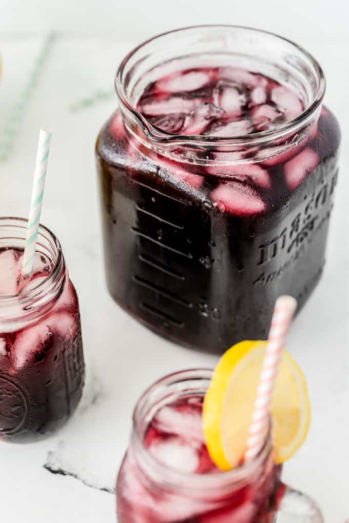 Sparkling Grape Lemonade - With bubbly lemon lime soda, frozen grape punch and lemonade, this drink is so easy to make when entertaining, or when you want to treat the kids to a special summery drink.