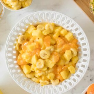 Sunshine salad in a white bowl.