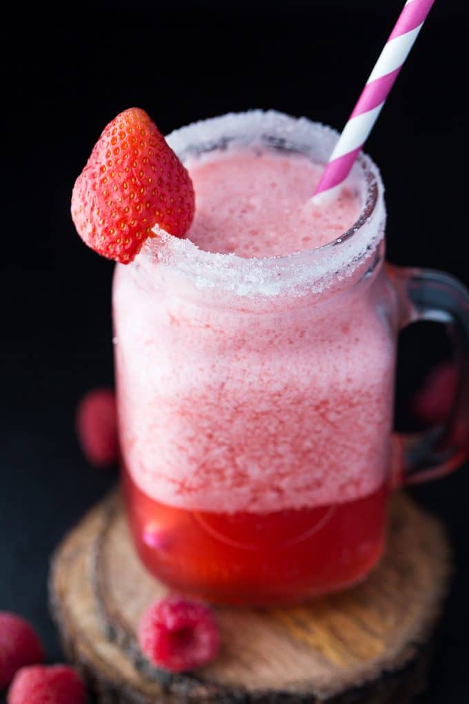 Pretty in Pink Punch - This rum-based cocktail is the perfect punch for a bridal shower or bachelorette party. With pink lemonade and Strawberry Daiquiri mix, it definitely lives up to its name!