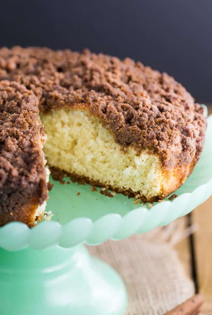 Streusel Coffee Cake - Another classic cake - for good reason! The crumbly cinnamon topping and the moist cake are the perfect pairing with a hot cup of coffee! This is a great make-ahead cake to have in the freezer for unexpected guests.