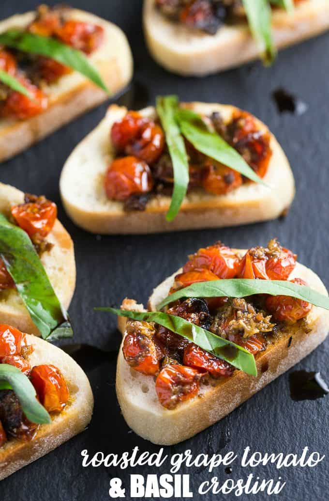 Roasted Grape Tomato and Basil Crostini - A toasted baguette is topped with grape tomatoes roasted in garlic and olive oil and finished off with ribbons of fresh basil and a drizzle of balsamic vinegar.