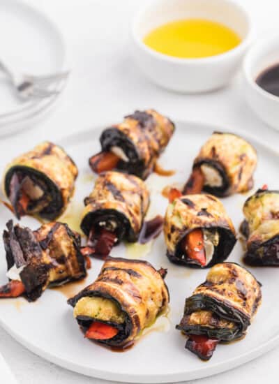 Grilled Zucchini Roll-Ups - A simple, but savoury summer appetizer. This recipe wraps goat cheese with grilled veggies. Mmm!