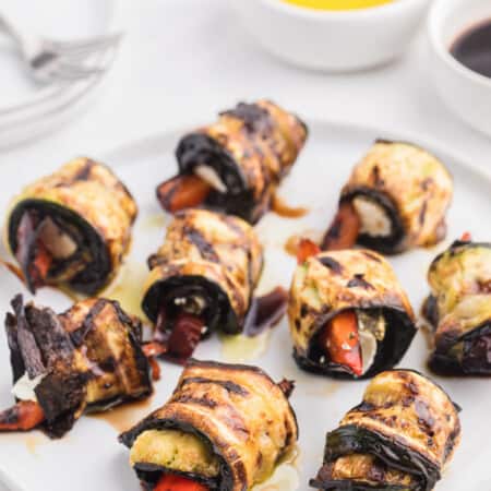 Grilled Zucchini Roll-Ups - A simple, but savoury summer appetizer. This recipe wraps goat cheese with grilled veggies. Mmm!