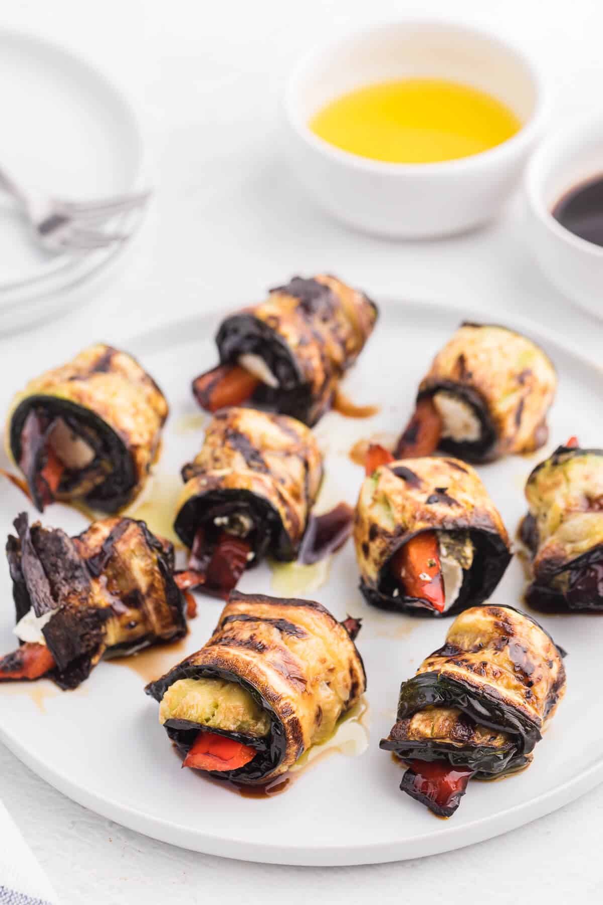 Grilled Zucchini Roll-Ups - A simple, but savoury summer appetizer. This recipe wraps goat cheese with grilled veggies. Mmm!