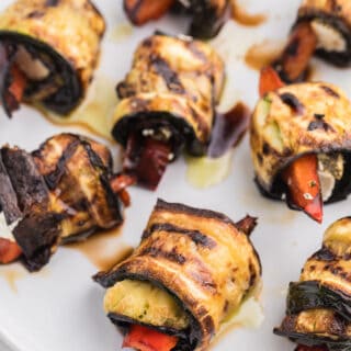 Grilled Zucchini Roll-Ups - A simple, but savoury summer appetizer. This recipe wraps goat cheese with grilled veggies. Mmm!