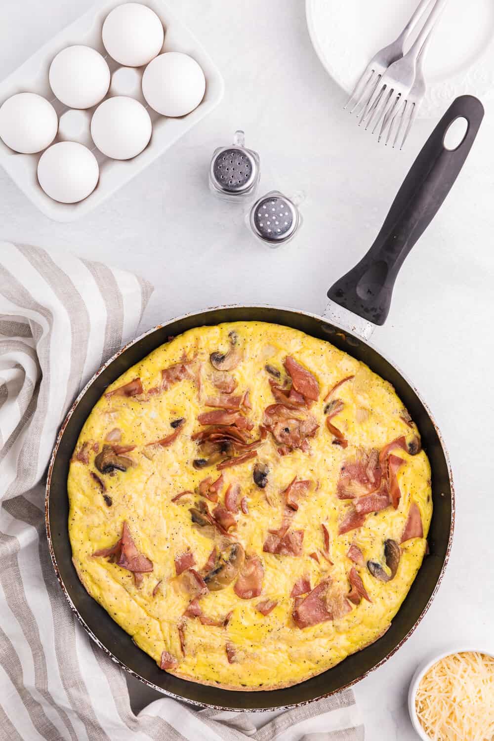 Turkey Bacon Frittata - Cut a few calories on this amazing brunch dish! Swap the pork for turkey in this delicious egg dish that's perfect for breakfast or dinner.