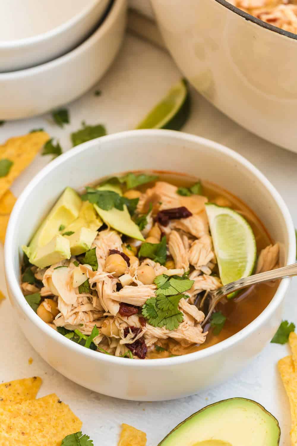 chipotle chicken soup in a bowl with a spoon