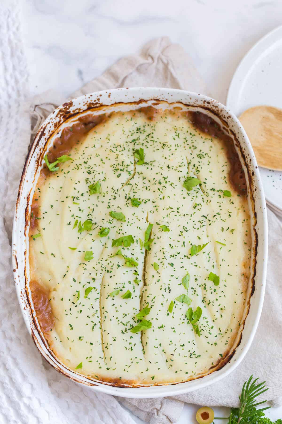 Beef Picadillo Shepherd's Pie on a white surface.