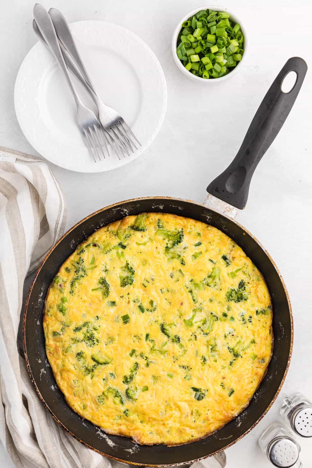 Broccoli Frittata - The classic and delicious combination of broccoli and cheese are the perfect pair in this quick and easy oven-baked frittata. Fresh or frozen broccoli can be used to make this quick and easy meal.