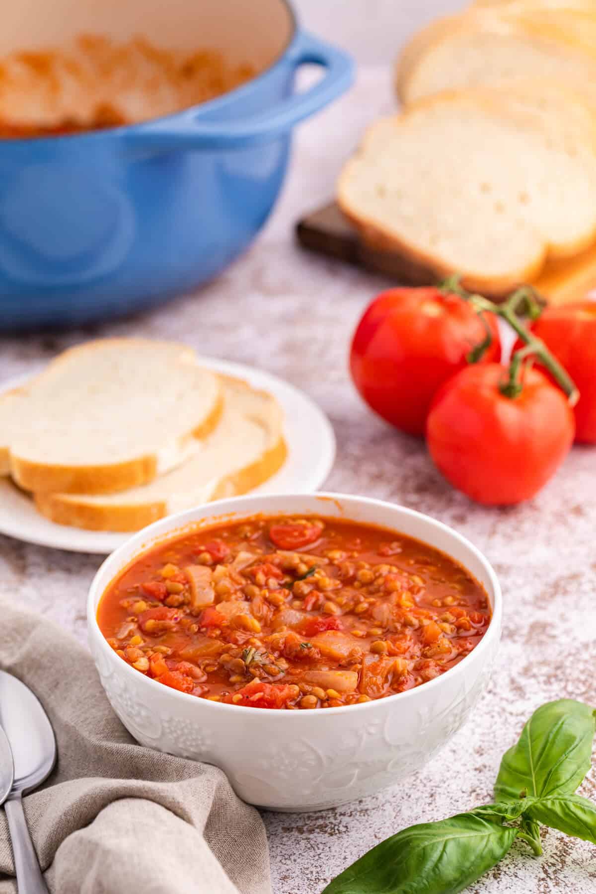 A bowl of tomato lentil soup.