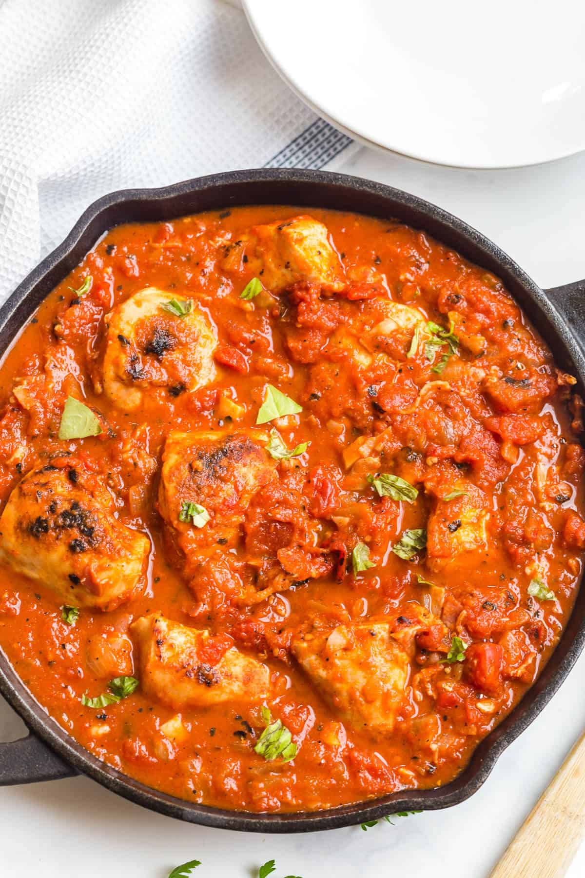 Roasted red pepper chicken in a skillet.