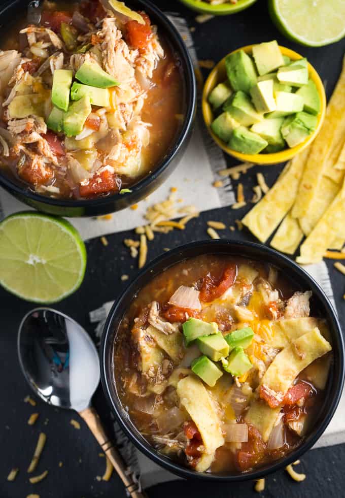 Chicken Tortilla Soup - A favorite slow cooker soup! Let it simmer all day for the best Mexican flavors in the diced tomatoes, shredded chicken, and green chiles.