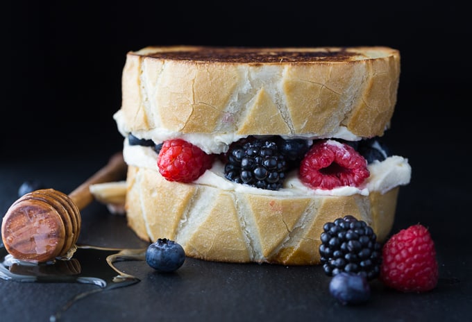 A decadent grilled cheese sandwich filled with mascarpone and mixed berries.