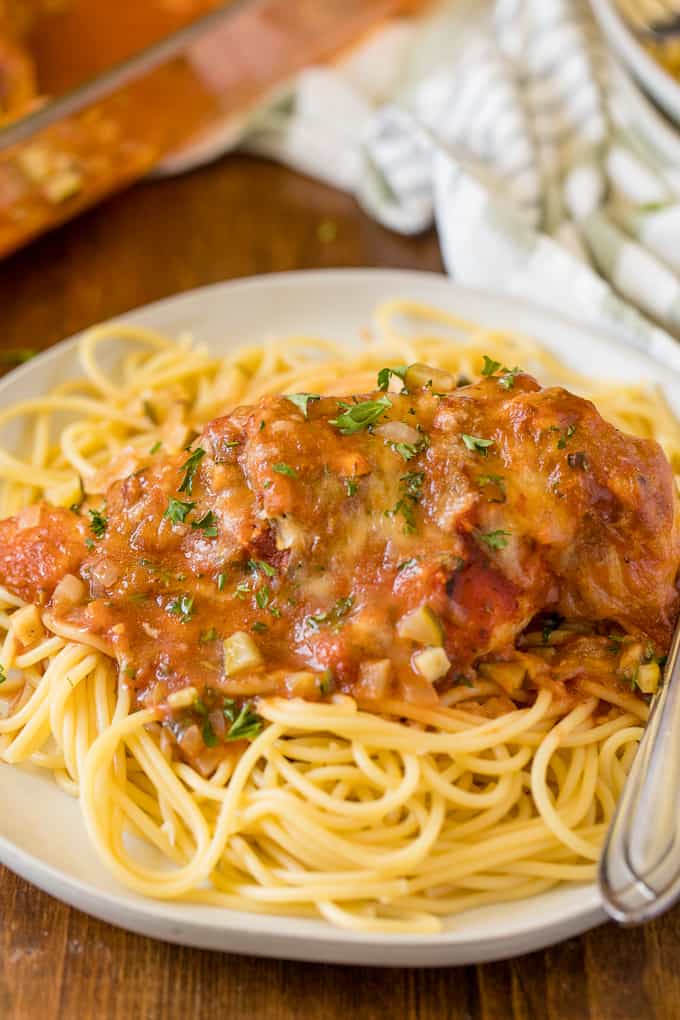 Baked Chicken Parmesan - Fast enough for a weeknight, but elegant enough for dinner parties! Serve over spaghetti or on its own.