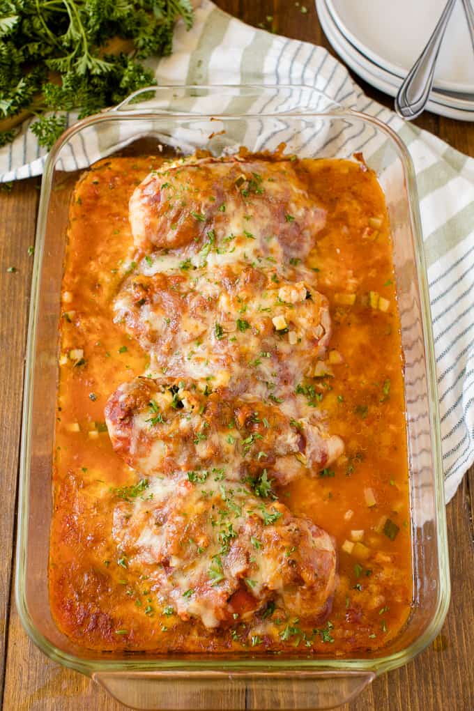 Baked Chicken Parmesan - Fast enough for a weeknight, but elegant enough for dinner parties! Serve over spaghetti or on its own.