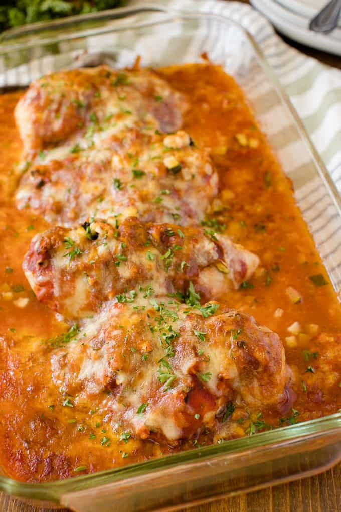Baked Chicken Parmesan - Fast enough for a weeknight, but elegant enough for dinner parties! Serve over spaghetti or on its own.