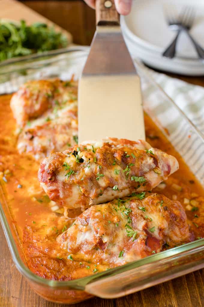 Baked Chicken Parmesan - Fast enough for a weeknight, but elegant enough for dinner parties! Serve over spaghetti or on its own.