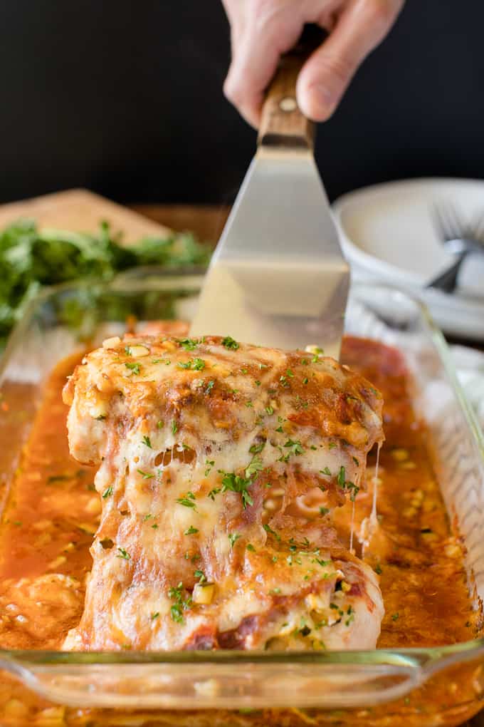 Baked Chicken Parmesan - Fast enough for a weeknight, but elegant enough for dinner parties! Serve over spaghetti or on its own.