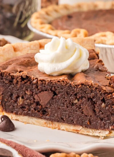 A slice of pie on a plate.