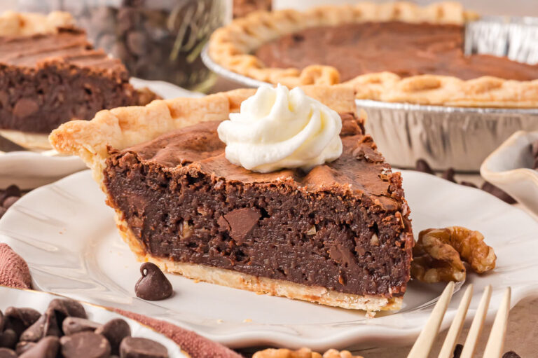 A slice of pie on a plate.
