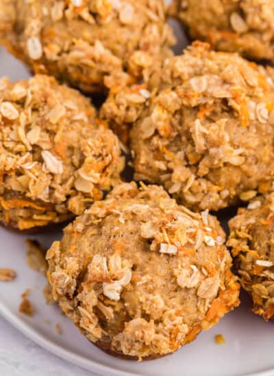 Double Orange Muffins - Packed full of goodness with carrots, orange juice, oat bran, flax seed, Greek yogurt and more. Make the night before to save time in the morning. Healthy and delicious!