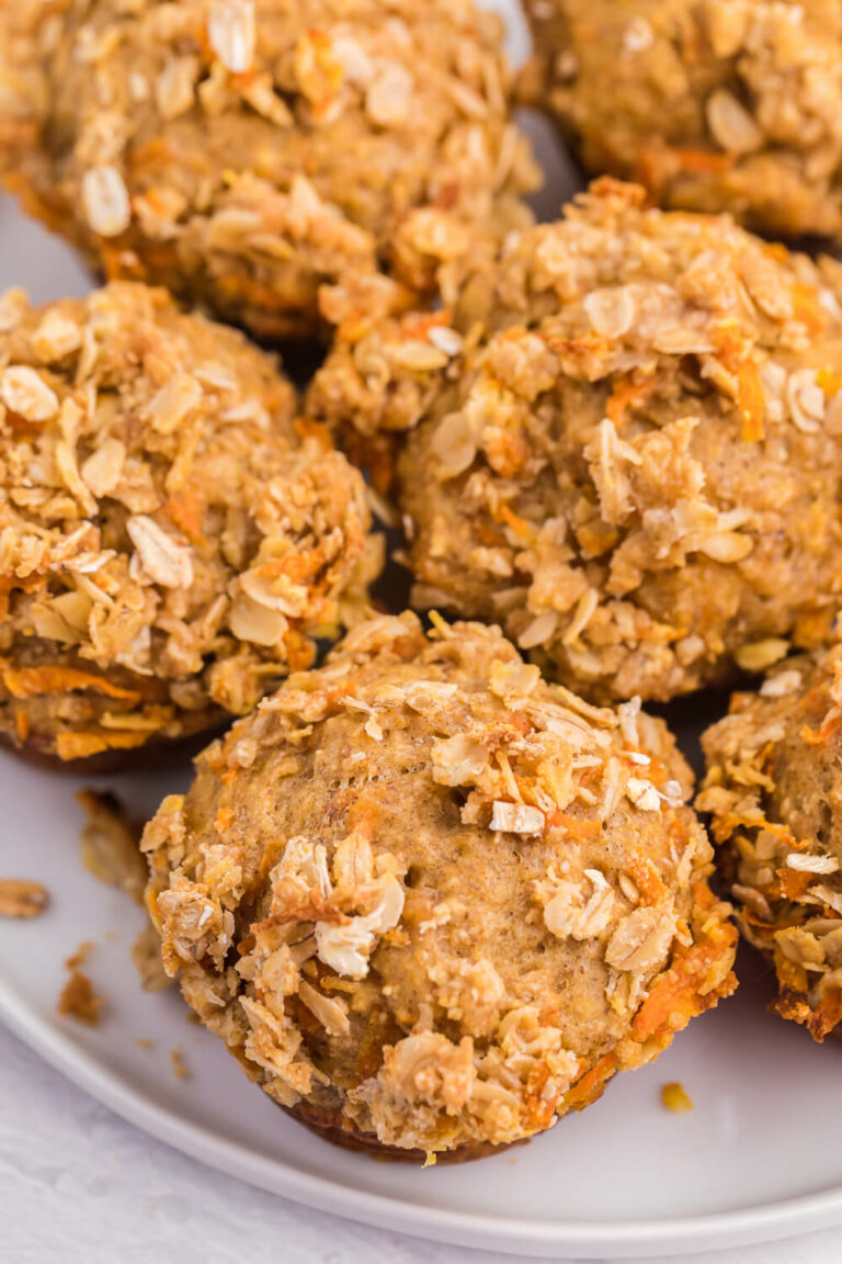 Double Orange Muffins - Packed full of goodness with carrots, orange juice, oat bran, flax seed, Greek yogurt and more. Make the night before to save time in the morning. Healthy and delicious!