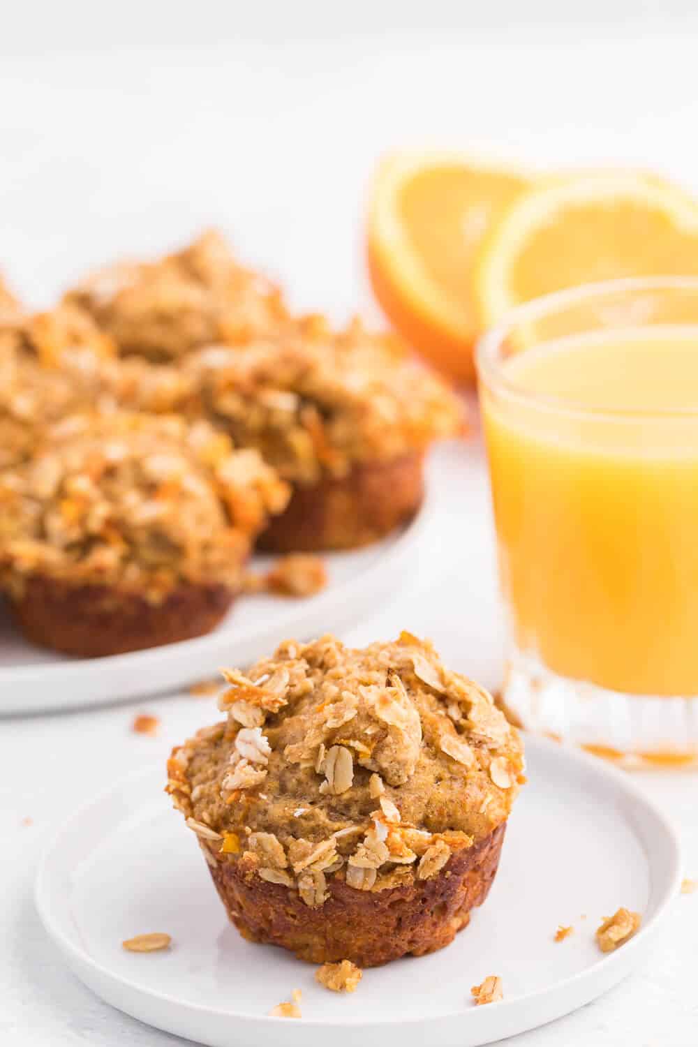 Double Orange Muffins - Packed full of goodness with carrots, orange juice, oat bran, flax seed, Greek yogurt and more. Make the night before to save time in the morning. Healthy and delicious!