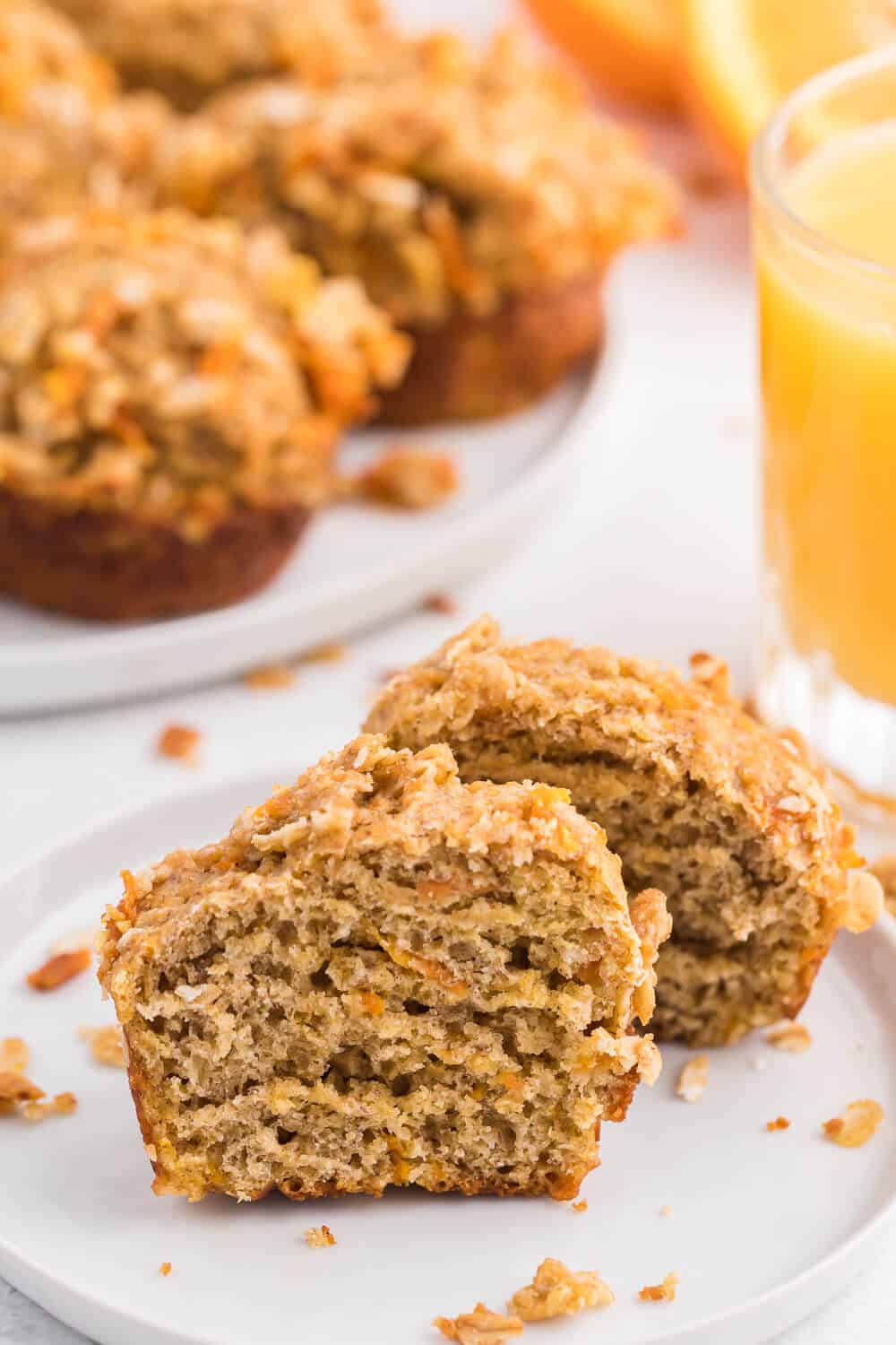 Double Orange Muffins - Packed full of goodness with carrots, orange juice, oat bran, flax seed, Greek yogurt and more. Make the night before to save time in the morning. Healthy and delicious!